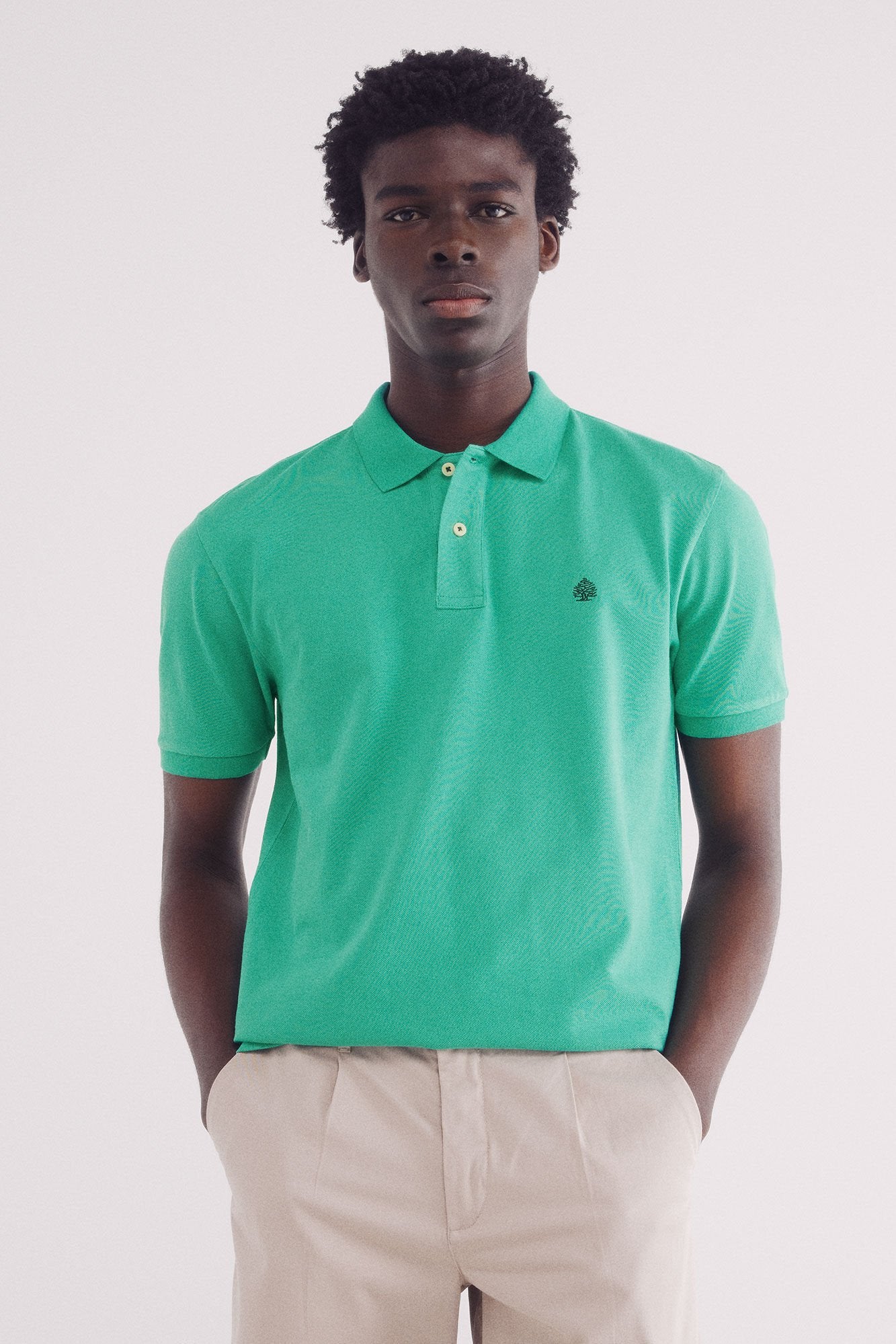 Green Polo|Essential regular fit piqué polo shirt|Springfield
