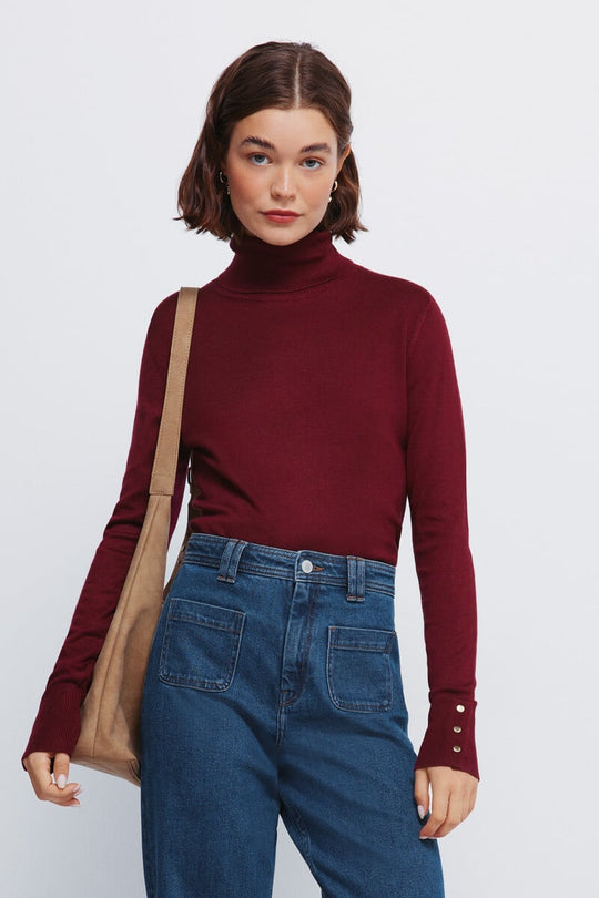 high neck jumper with buttons and cuffs