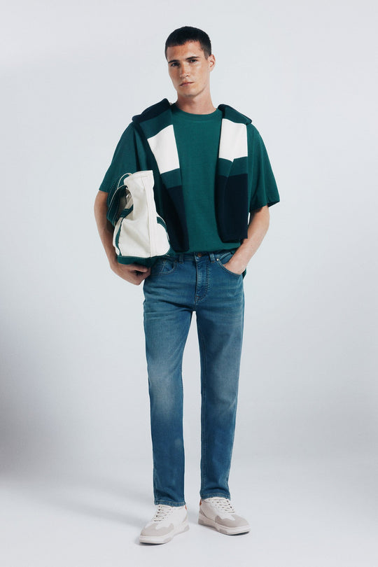 Slim fit overdyed knit denim jeans