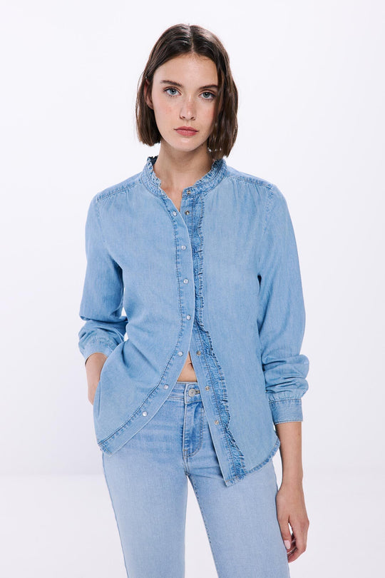 Ruffled denim blouse