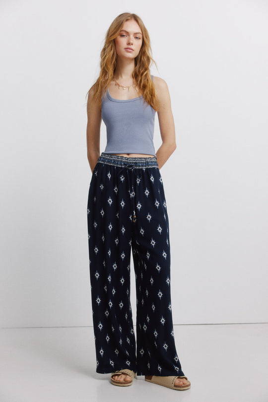 Printed rustic drawstring trousers