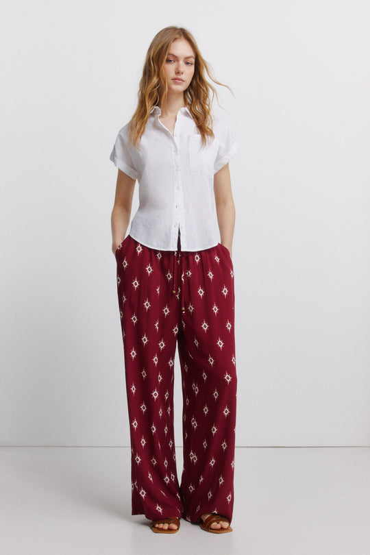 Printed rustic drawstring trousers
