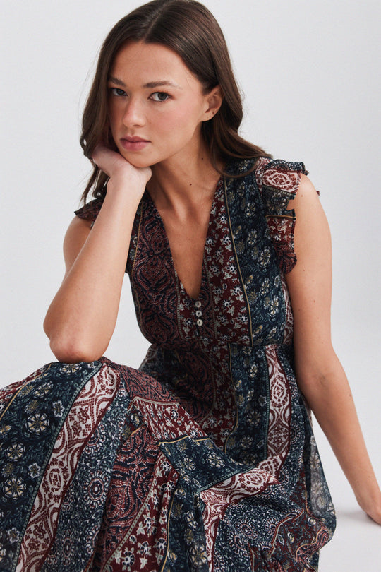 Border print ruffle dress