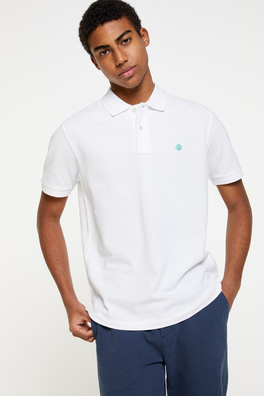 Polo With Tree Embroidery In Contrast Color